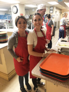 Curate Partners team members serving at Rosie's Place