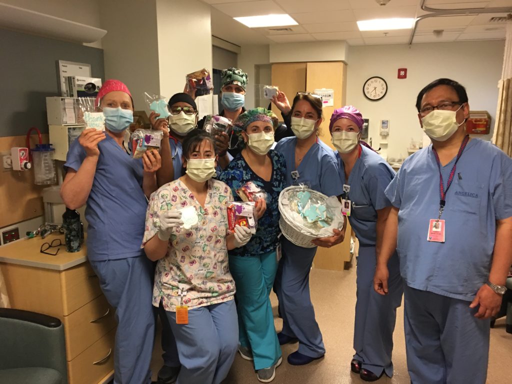 Group of nurses with thank you basket