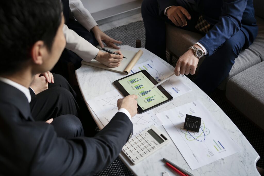Finance Firm Employees discussing firm growth